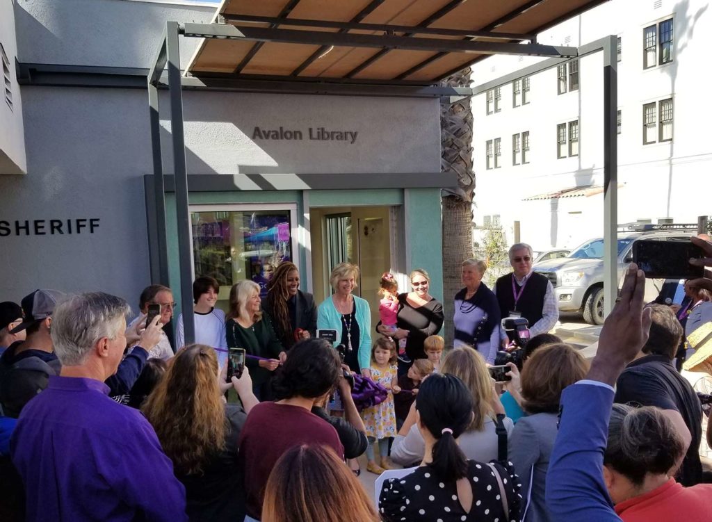 Crowd supporting the open+ install at Avalon library