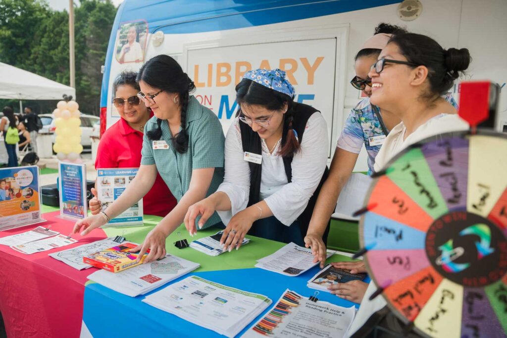 Gwinnett county mobile library event FXL06710 | Where are they now? Gwinnett County Public Library: Magnifying access with open+