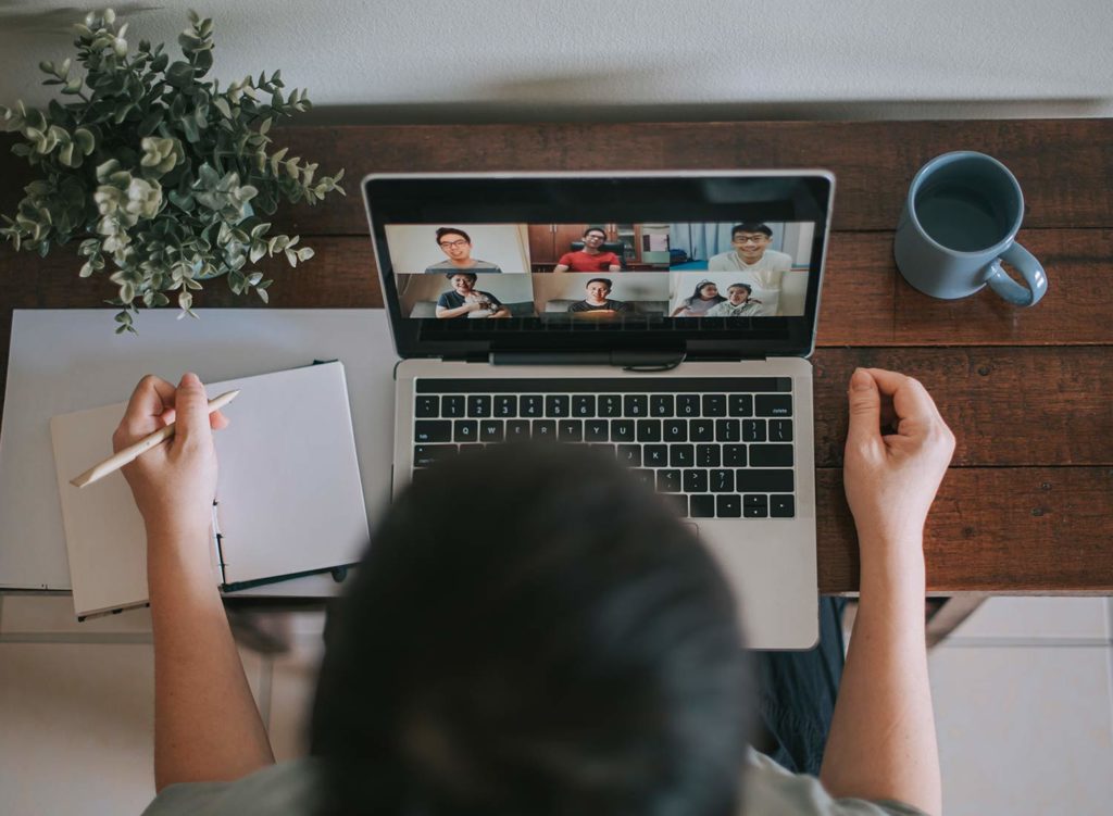 person on a conference call on laptop
